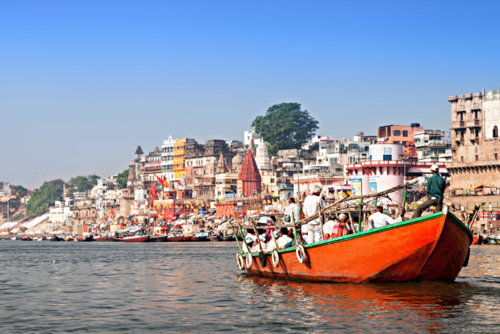 What is the significance of the ghats in Varanasi, and which ones should I visit?