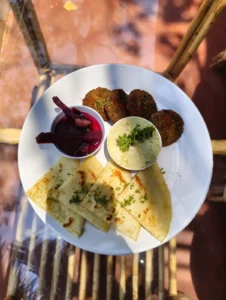 Hummus and falafel with flatbread and beetroot pickle at House of Ullassa Cafe, Chapora